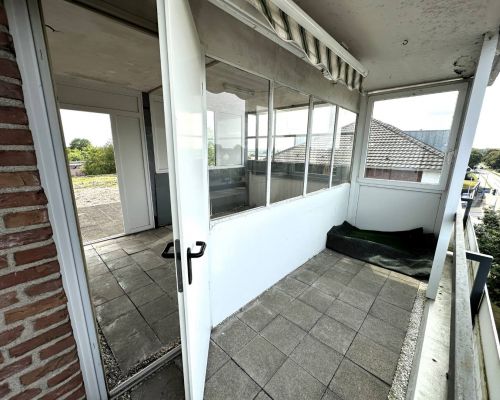 Balkon mit überdachter Terrasse