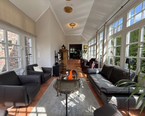 23 Blick im Wintergarten zum Wohnraum